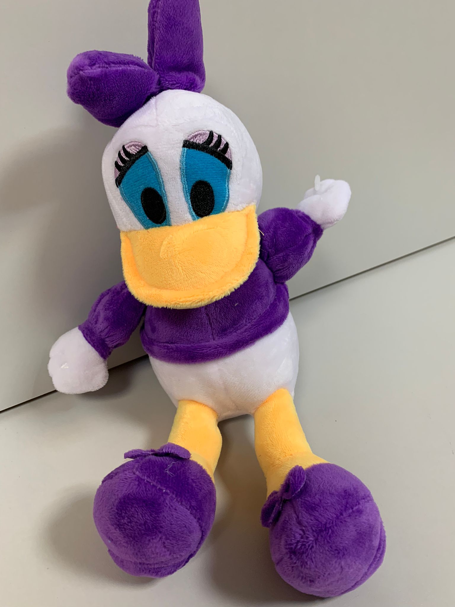 Plush character Daisy from Donald the duck, purple