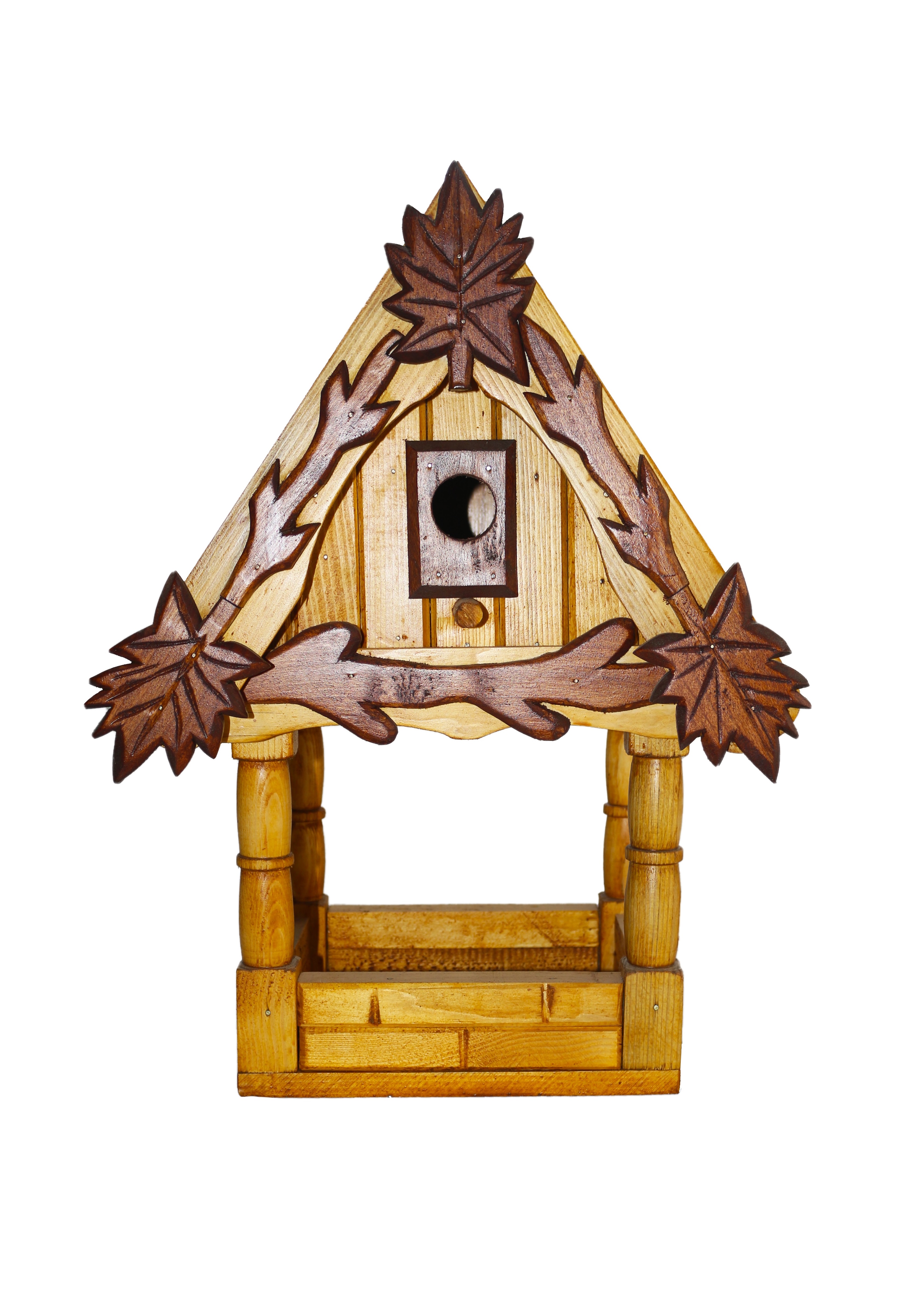 Massive birdhouse with bird feeder - bright with ornaments on the house
