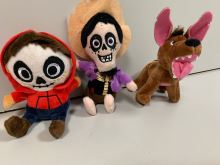 A set of plush characters from the movie Coco, big